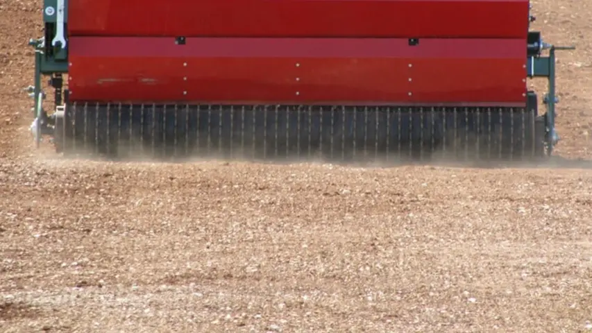 Drill seeding land